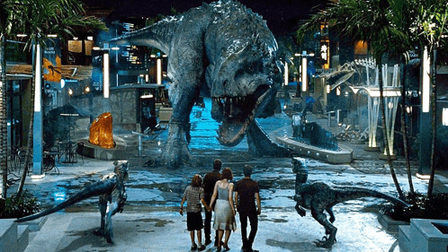 a group of people standing in front of a large dinosaur with a sign in the background that says ' a '