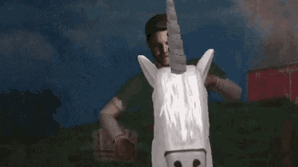 a man riding on the back of a unicorn
