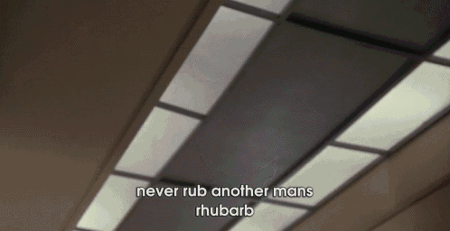 a blurry picture of a joker with the words `` never rub another man 's rhubarb '' .