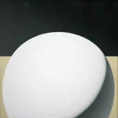 a white circle on a black background with a shadow