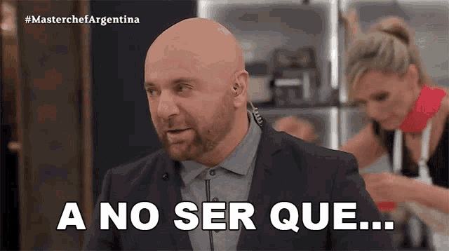 a bald man in a suit says " ano ser que "