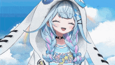 a girl with blue and pink hair is wearing a bunny hood