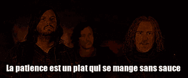 three men are standing in a dark room with the words la patience est un plat qui se mange sans sauce