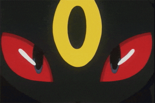 a yellow circle with the number 0 on it and red eyes