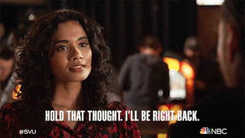 a woman says hold that thought i 'll be right back on a screen
