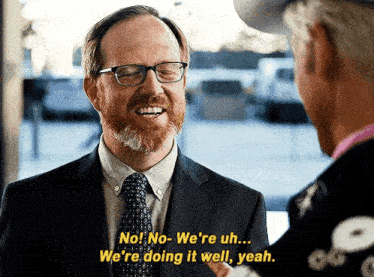 a man with glasses and a beard says no we 're uh we 're doing it well yeah ..