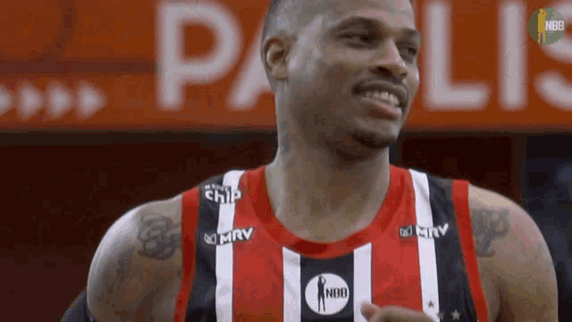 a basketball player wearing a jersey that says nbb on the front