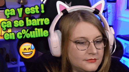 a woman wearing headphones with cat ears says ca yest