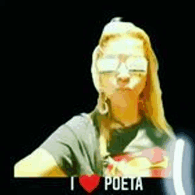 a woman wearing sunglasses and a t-shirt that says `` i love poeta '' is taking a selfie .