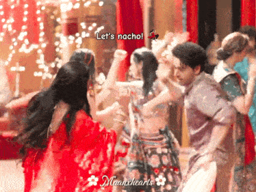 a group of people are dancing with the words let 's nacho written above them