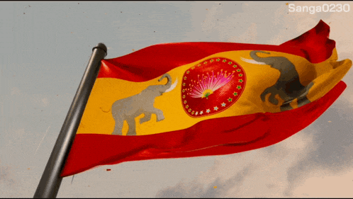 a red and yellow flag with elephants and a flower in the middle