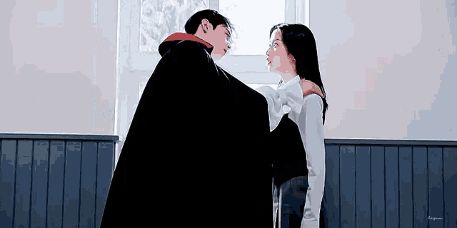 a man in a black cape is hugging a woman in a white shirt in front of a window .