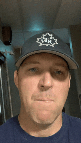 a man wearing a hat that says vfr