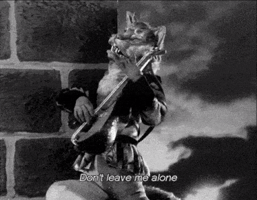 a black and white photo of a cat playing a violin with the caption " do n't leave me alone " below it