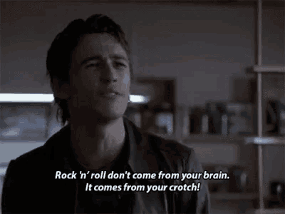 a man with a cigarette in his mouth says " rock n ' roll don 't come from your brain "