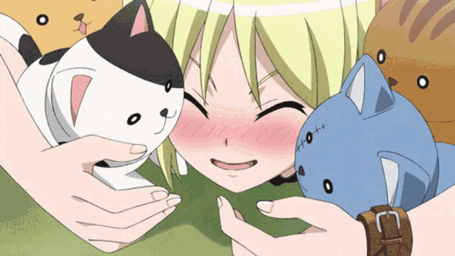 a girl is petting a black and white cat and a blue cat with the letter t on it