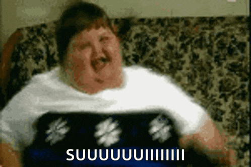 a fat man is sitting on a couch with the words suuuuuiiii written on the bottom right