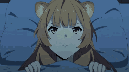 a girl with a cat ear is laying in bed with a hand on her forehead