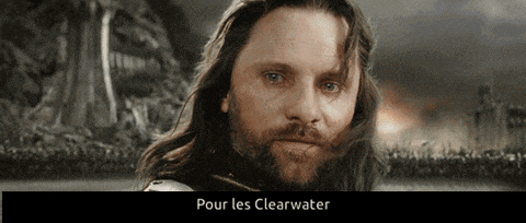 a man with long hair and a beard looks at the camera with pour les clearwater written above him
