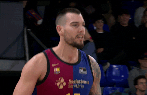 a basketball player wearing a jersey that says 14 on it
