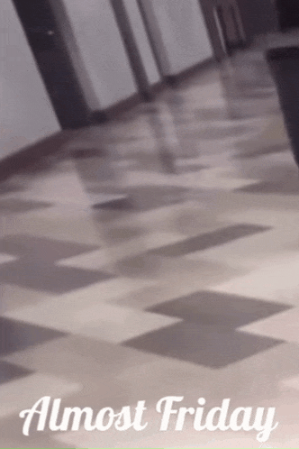 a photo of a hallway with the words " almost friday " on the bottom
