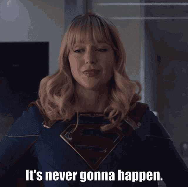 a woman in a superman costume has the words " it 's never gonna happen " below her