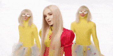 a woman in a red dress is surrounded by two men in yellow costumes with the words very best written on the bottom