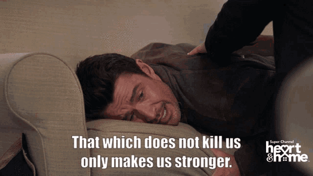 a man laying on a couch with the words that which does not kill us only makes us stronger on the bottom