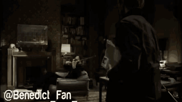 a man playing a violin in a dark room with the name benedict_fan written on the bottom