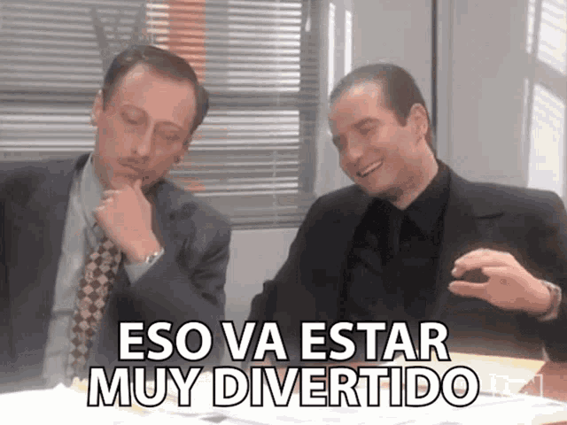 two men sitting at a table with the words eso va estar muy divertido