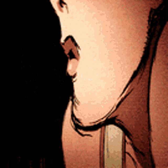 a close up of a person 's face with a slight shadow