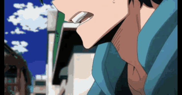 a close up of a person 's face with a blue hoodie on .