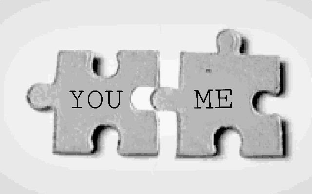 a couple of puzzle pieces that say you and me