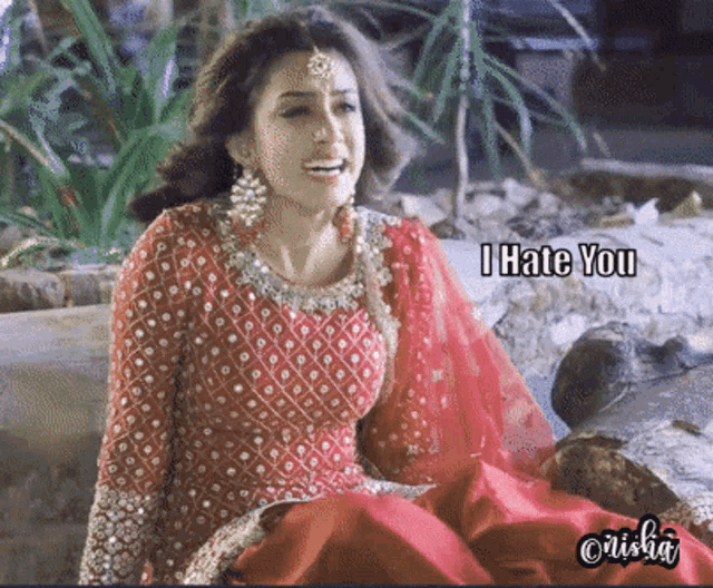 a woman in a red dress with the words i hate you on the bottom right