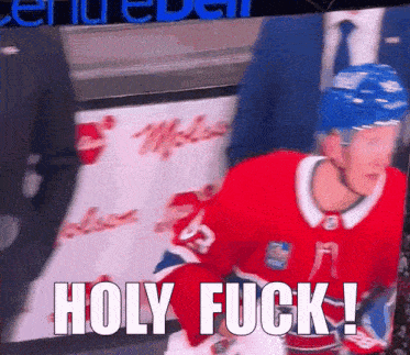 a hockey player says holy fuck in front of a banner that says center
