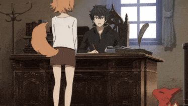 a man sitting at a desk with a pen in his hand and a woman standing next to him