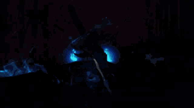 a painting of a person in a dark room with a blue background
