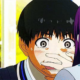 a close up of a person covering another person 's mouth