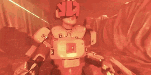 a man in a space suit is holding a gun in a video game