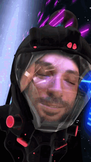 a man with his eyes closed wearing a futuristic helmet with red buttons