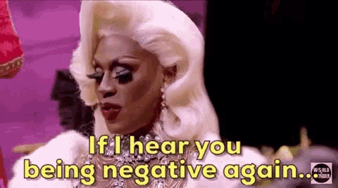 a drag queen is saying `` if i hear you being negative again '' .