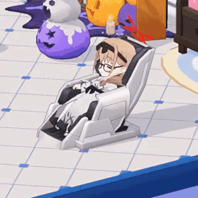a girl is sitting in a chair in a room with a candle in the background .