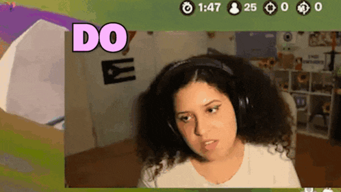 a woman wearing headphones with the word do on the screen