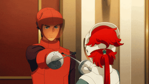 a man in a red helmet is holding a sword in front of another man with red hair