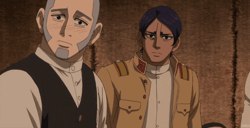 a man with a beard is standing next to another man in a tan uniform