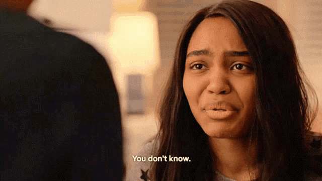 a woman says " you don 't know " while looking at another person