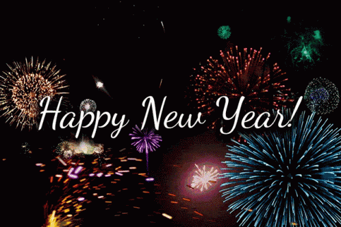 a fireworks display with the words happy new year written below it