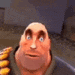 a close up of a cartoon character making a funny face while holding a bunch of pencils .