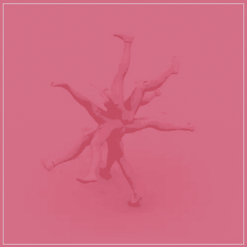 a group of pink mannequins are standing on a pink background .