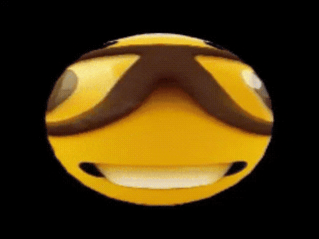 a close up of a smiley face with the word nerd written on it .